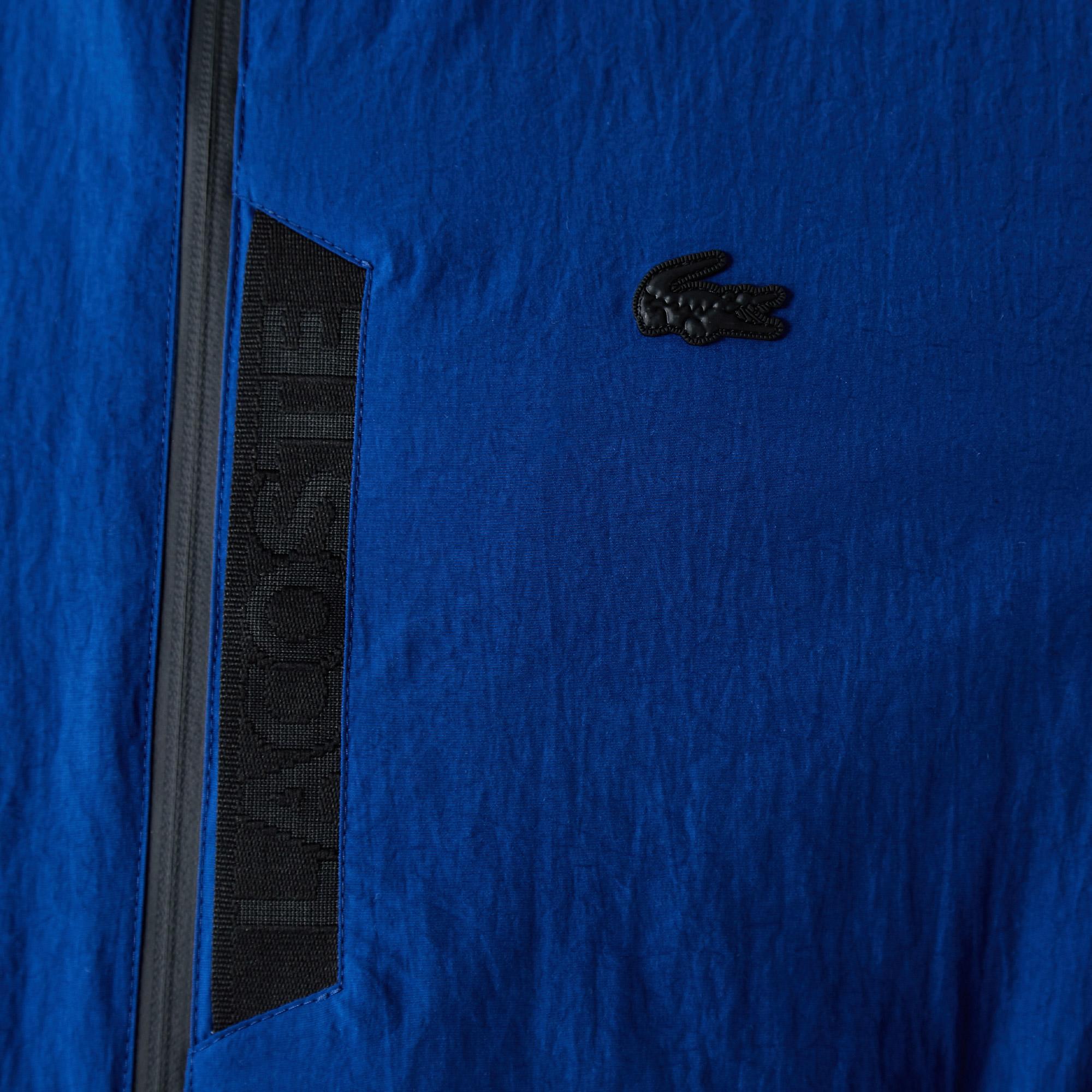 Lacoste Erkek Kapüşonlu Suya Dayanıklı Mavi Yağmurluk. 10